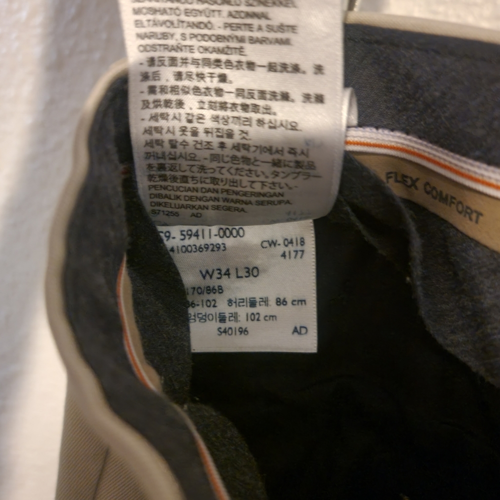 Dockers tan, khaki slack, pleated front, classic fit...  like new 34×30 - Picture 3 of 4